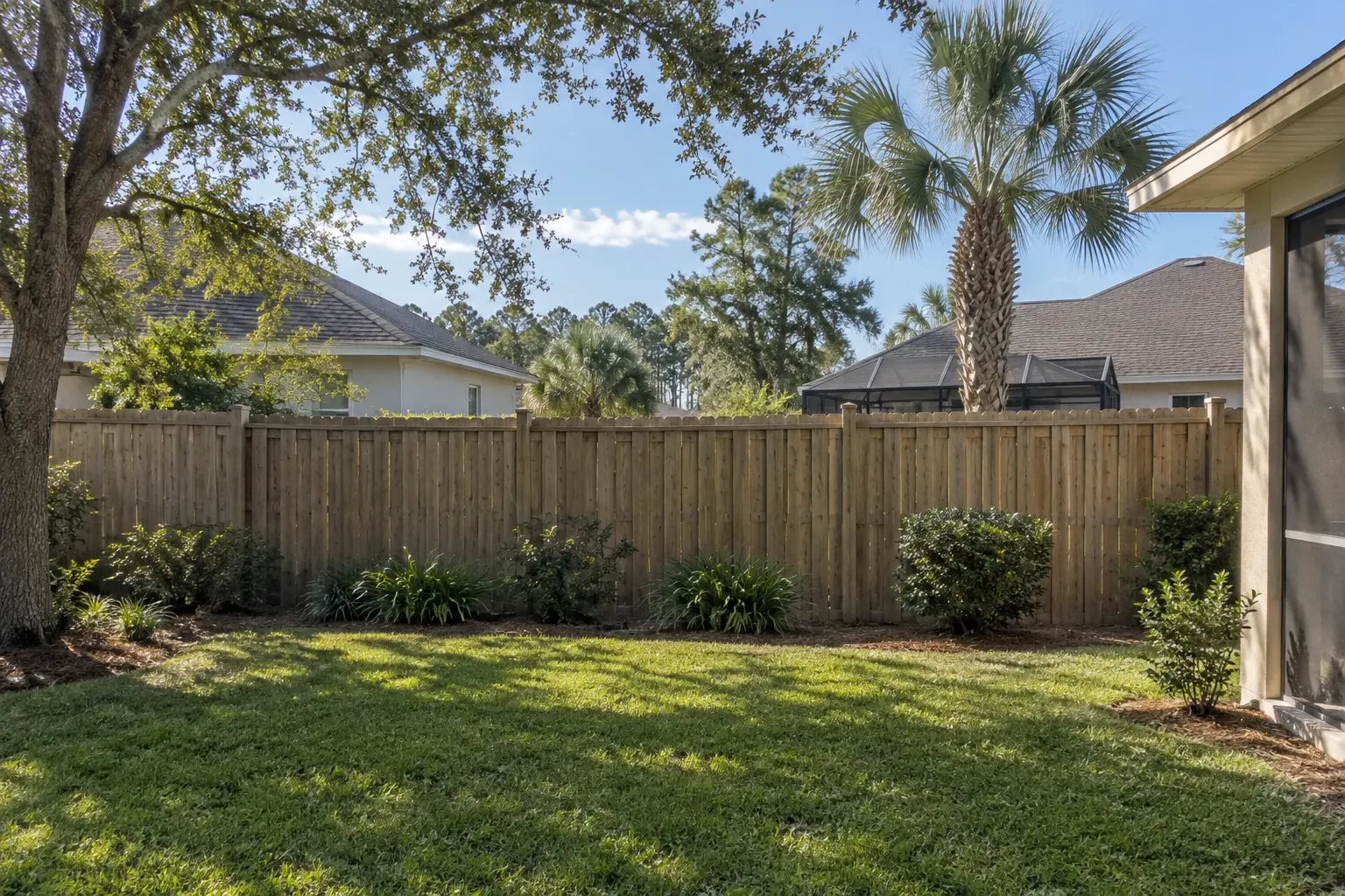 Privacy fence between neighboring Jacksonville Florida backyards